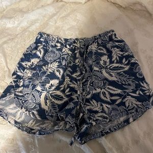 Blue tropical print shorts